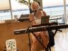 Lauren Glick sings an original song against the backdrop of a beautiful sunset at The View, Cambria Hotel.